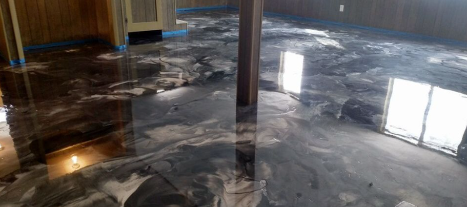 Metallic epoxy floor in a basement of Rock Hill,NC. The work was done by Epoxy Floor Rock Hill Pros.