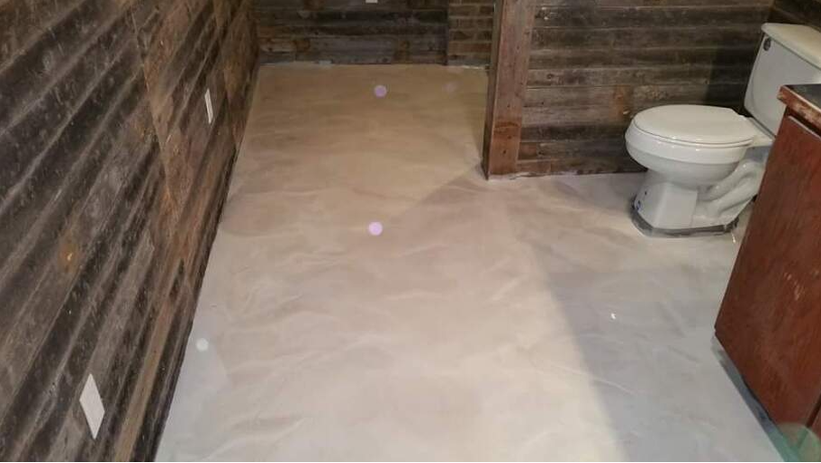 Metallic epoxy floor in a bathroom of a commerce of Rock Hill,NC. Job done by Epoxy Floor Rock Hill Pros.
